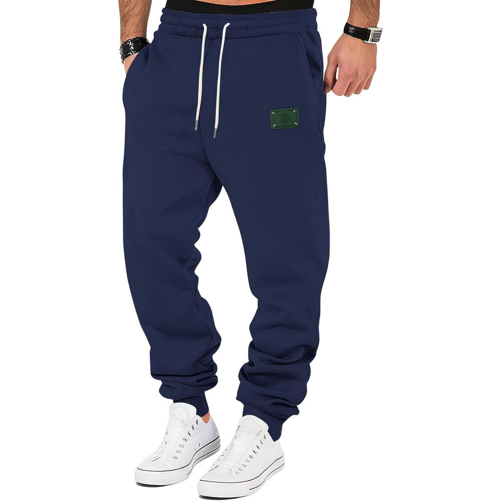 imageMens Fleece Sweatpants Warm Winter Pants Athletic Drawstring Jogger Pants with PocketsNavy